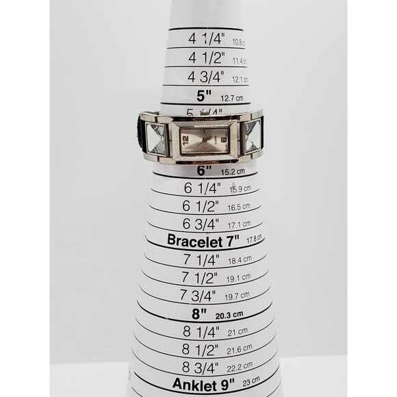 Women\'s dress watch. Silver iridescent square face. Jewels connect face to band main image 6